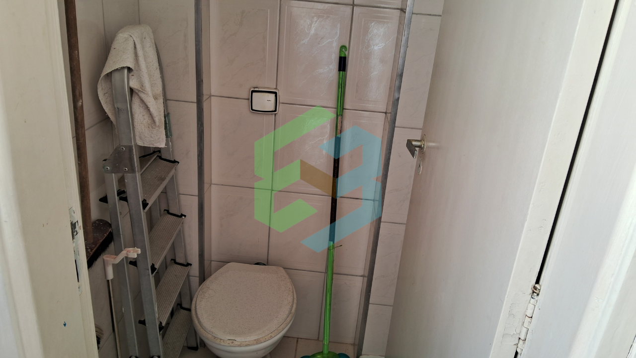 Apartamento 2 dormitórios, 1 vaga, no Centro, próximo a praia