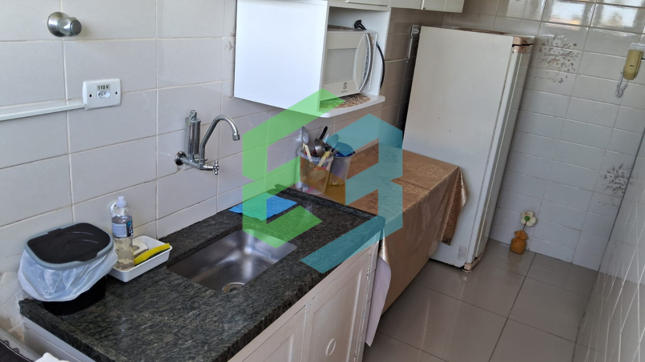 Kit no Centro com 1 dorm e garagem